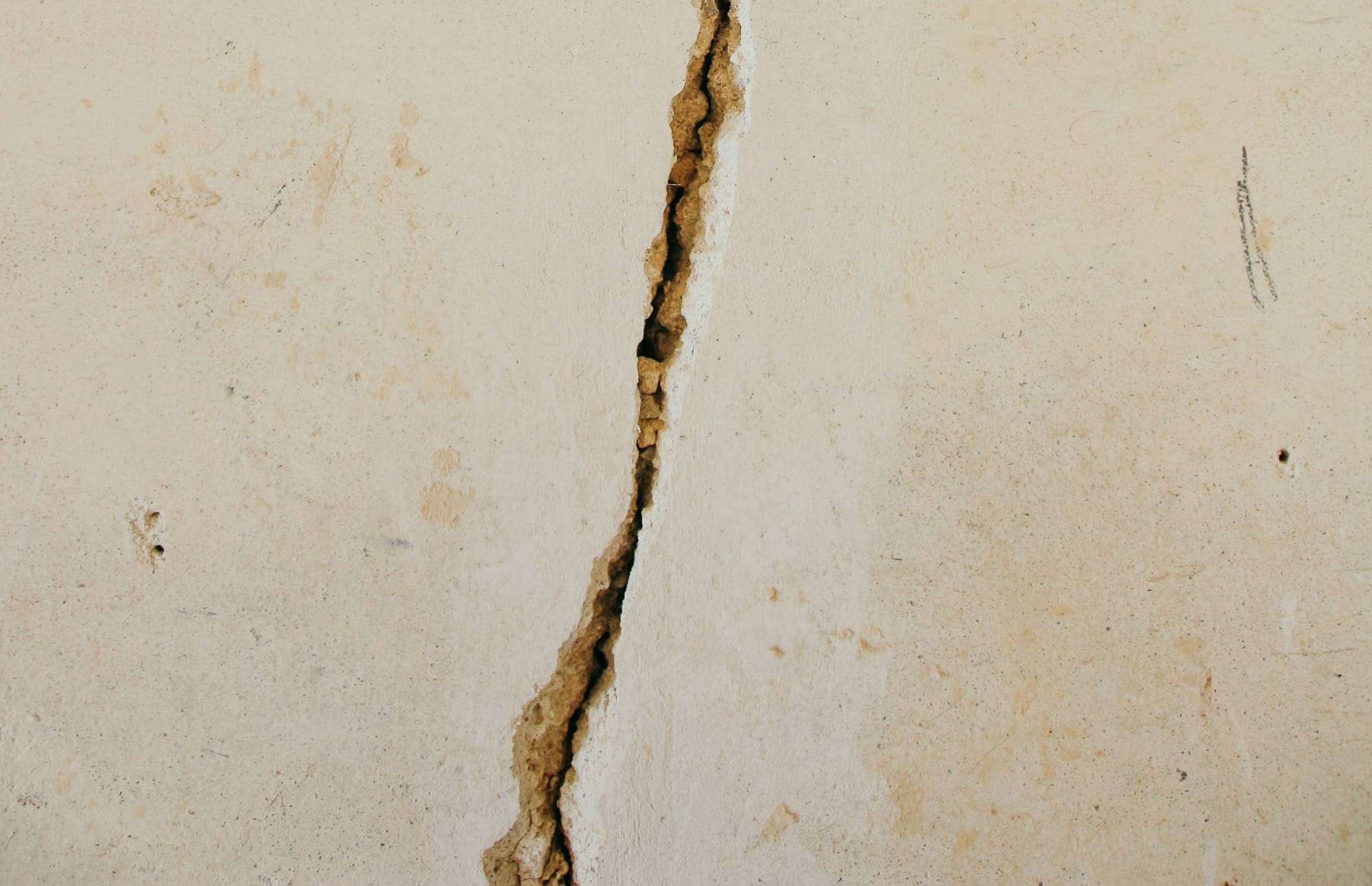 crack on white concrete surface